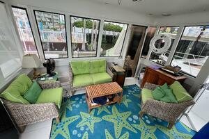 Interior of 2000 Carver 506 Motor Yacht with green seating a