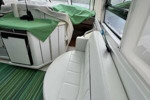 Interior of 2000 Carver 506 Motor Yacht with white seating a