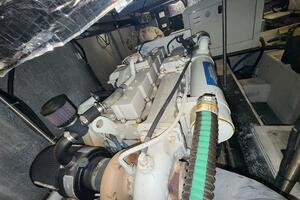 Engine room of 2000 Carver 506 Motor Yacht, showcasing mecha