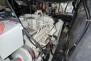 Engine room of a 2000 Carver 506 Motor Yacht, showcasing mec