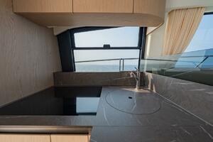 Modern kitchen interior on 2023 Azimut Fly 53 yacht with oce