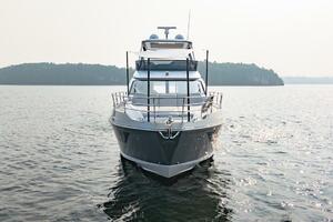 2023 Azimut Fly 53 yacht on calm water with scenic island ba