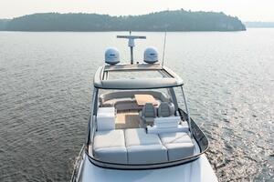 2023 Azimut Fly 53 yacht cruising on serene waters, showcasi