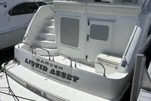 2006 Carver 43 Motor Yacht docked, rear view, named 
