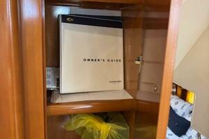 Owner's guide in wooden cabinet on Carver 43 Motor Yacht, 20
