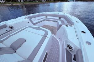 2024 Scout 400 LXF boat interior with luxurious seating and waterfront view.
