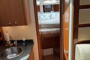 2006 Carver 43 Motor Yacht interior with wood cabinetry, sin