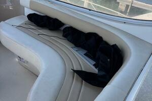 2006 Carver 43 Motor Yacht with white curved seating and sce