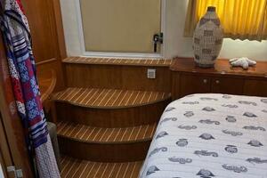 Interior of 2006 Carver 43 Motor Yacht with wooden steps and