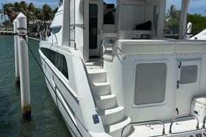2006 Carver 43 Motor Yacht docked, featuring spacious deck a
