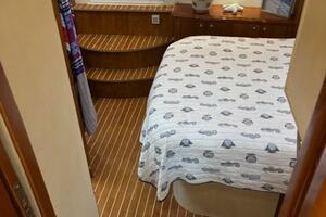 Interior of 2006 Carver 43 Motor Yacht with cozy bedroom and