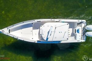 Aerial view of 2022 CG Boat Works 35 M-Series on clear water.