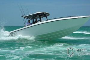 2022 CG Boat Works 35 M-Series cruising on turquoise waters.