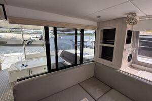 2018 Leopard Power Cat Dinette Storage facing aft