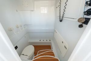 2015 Yellowfin 39 boat interior with toilet and wooden floor