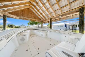 2015 Yellowfin 39 boat under wooden canopy, showcasing spaci
