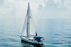 Sailing yacht Beneteau Oceanis 45, 2015 model, on calm ocean