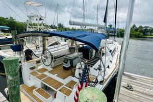 2015 Beneteau Oceanis 45 sailboat docked, featuring a blue c