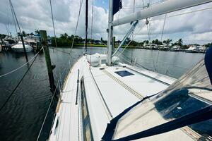 Beneteau Oceanis 45 sailboat docked in a marina, 2015 model,