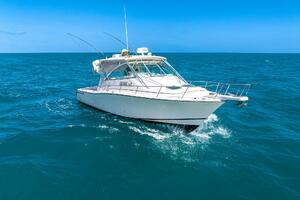 2007 Grady-White Express 360 boat cruising on open blue ocea