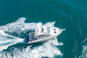 2007 Grady-White Express 360 cruising on open blue waters, a