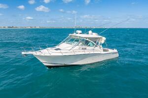 2007 Grady-White Express 360 boat on open sea under clear bl
