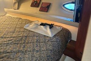 Cozy cabin interior of 2007 Monterey 350 Sport Yacht with pa