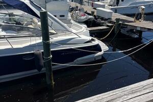 2007 Monterey 350 Sport Yacht docked at a marina with other 
