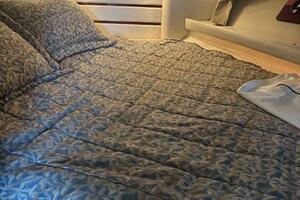 Cozy cabin interior of 2007 Monterey 350 Sport Yacht with pa