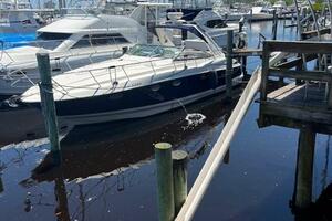 2007 Monterey 350 Sport Yacht docked in marina, surrounded b