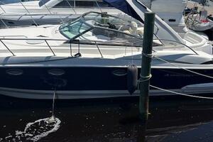 2007 Monterey 350 Sport Yacht docked at a marina with other 