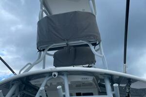 2018 Regulator 41 boat with tower against cloudy sky backdrop.