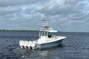 2018 Regulator 41 boat with four engines cruising on open wa