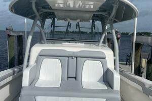 2018 Regulator 41 boat docked, featuring spacious seating and sleek design.