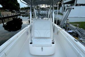 2023 Contender 24 Sport boat interior with seating and conso
