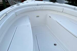 2023 Contender 24 Sport boat interior with white seating and