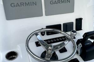 2023 Contender 24 Sport boat dashboard with Garmin displays 