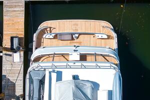 Overhead view of 1996 ABD 90 Explorer yacht docked at a wooden pier.