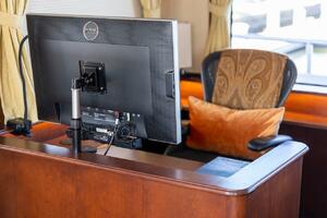 Pilot cabin of 1996 ABD 90 Explorer yacht with steering wheel and control panels.