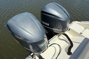 Twin Yamaha outboard engines on a 2015 Cobia 296 Center Cons