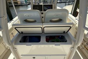 2015 Cobia 296 Center Console boat interior with open storag