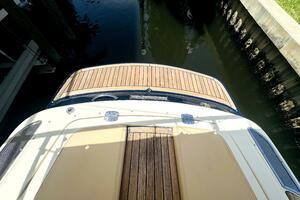2013 Chris-Craft Corsair 22 boat with teak deck, docked in c