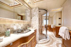 Master Ensuite with His and Her Sinks and Private WCs