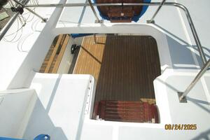 48' DeFever flybridge-trunk cabin steps