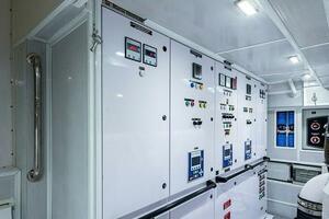 Engine room of 2020 Majesty 140 yacht with control panels an