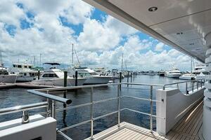 Luxury yacht Majesty 140, 2020 model, docked at marina under