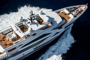 Luxurious 2020 Majesty 140 yacht cruising on open water, aer