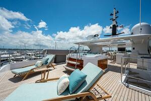 Luxurious 2020 Majesty 140 yacht deck with sun loungers and 
