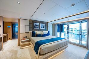 Luxurious bedroom on 2020 Majesty 140 yacht with modern deco