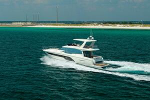 2019 Prestige 590 Fly 'New Heart' - Profile Port 3/4 Stern